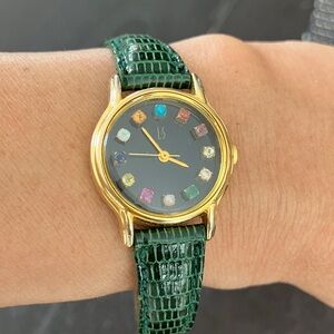 VTG 1990s Lazy Susan BrithStone Round Black Face gold and green Watch
